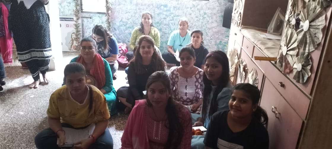 Women attending a SACHI Foundation community support session